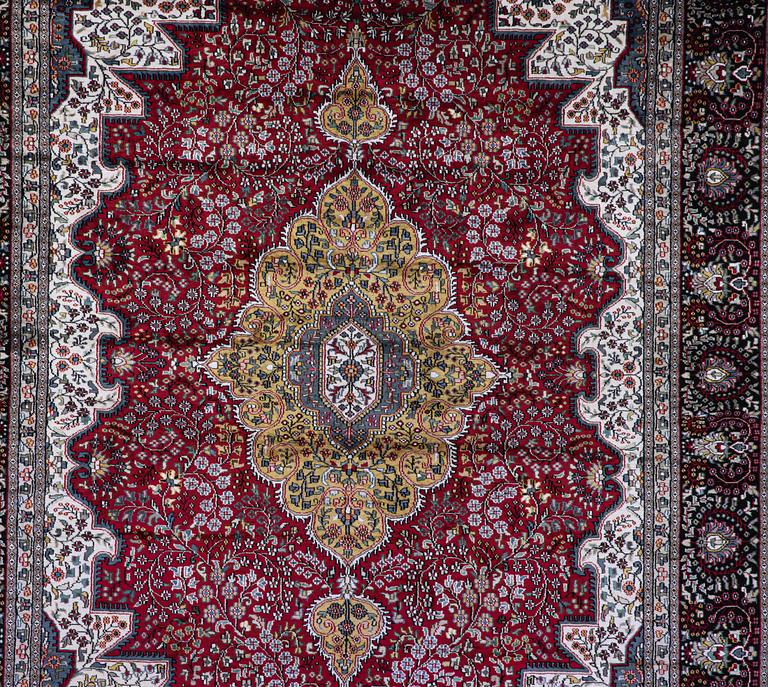 A carpet, Oriental Silk, ca 337 x 241 cm.
