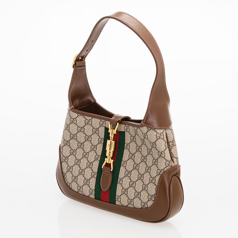 Gucci, a monogram 'Jackie' Bag.