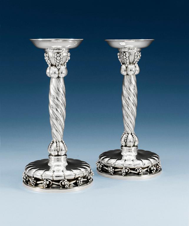 A PAIR OF GEORG JENSEN sterling candlesticks, Copenhagen 1945-77, design nr 264, Swedish import marks.