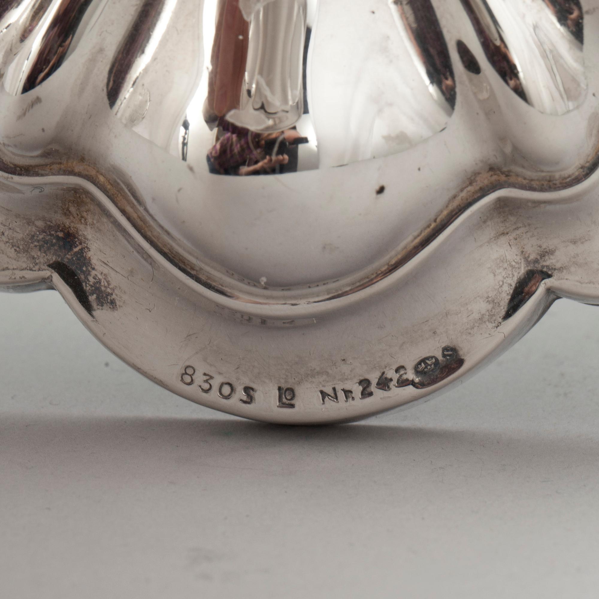 LJUSSTAKAR, ett par, silver, med svenska importstämplar, 1900-tal.
