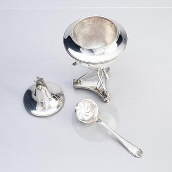 A Swedish 19th century silver sugar bowl with lid, mark of Abraham Hamnqvist, Åmål 1819 and a sugar sprinkle spoon.