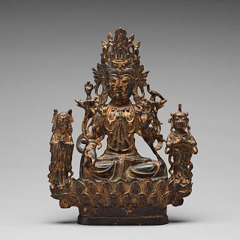 672. A bronze sculpture of boddhisattva and two attendants, Ming dynasty (1368-1644).