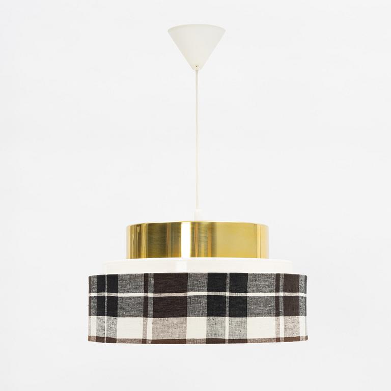 A brass and textile ceiling light. Luxus, Vittsjö.