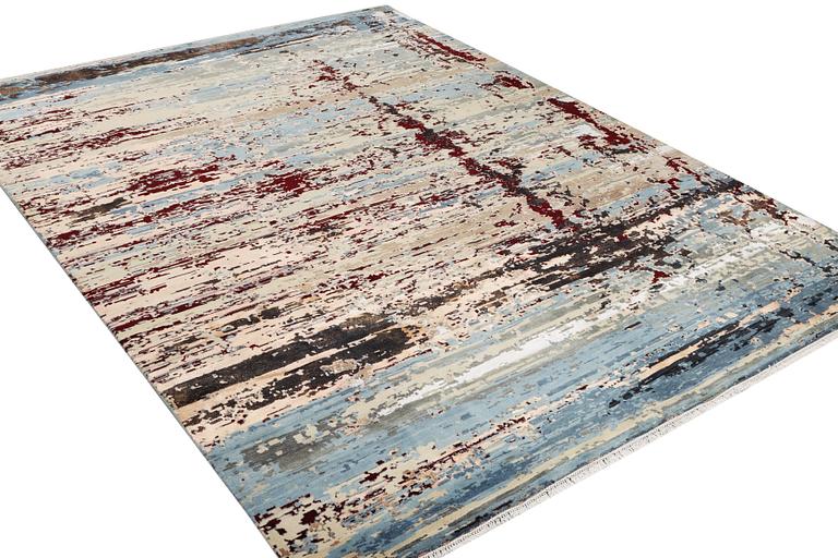 An oriental carpet with modern design, ca. 377 x 277 cm.