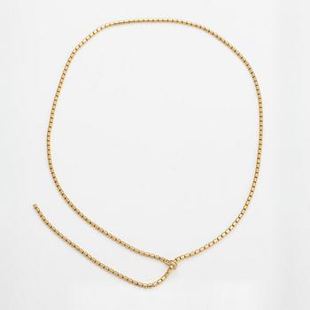 Piaget, An 18K gold "Possession" necklace with diamonds ca. 0.17 ct in total. Marked Piaget D18828.