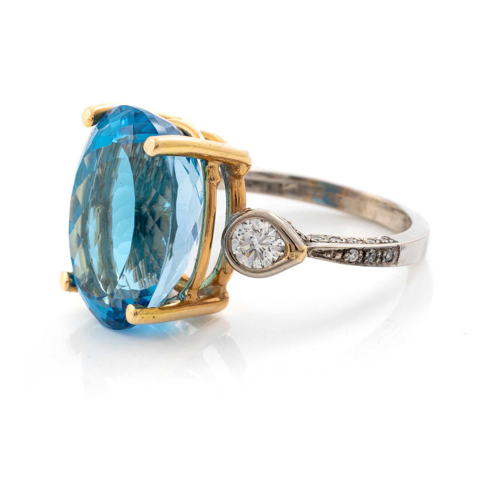 Ring, Mandelstam, 18K gold and white gold with blue topaz and brilliant-cut diamonds.