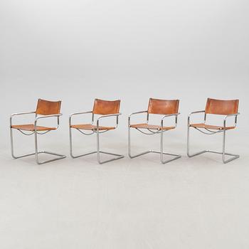 A set of four Italian late 20th century chrome and leather armchairs.