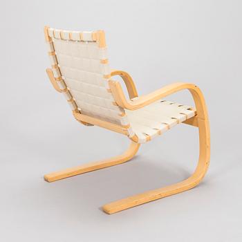 Alvar Aalto, a 1980s Artek 406 armchair.