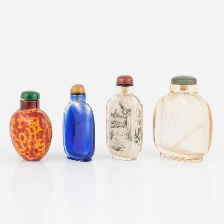 Ten snuff bottles, stone, glass and cloisonné, China, 20th century.