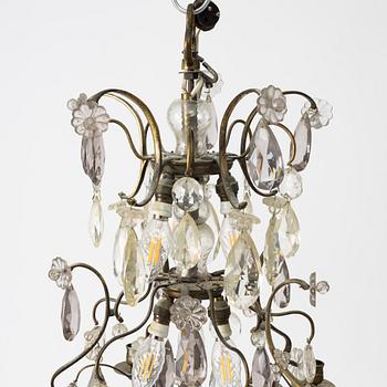 A Rococo style chandelier, early 20th Century.