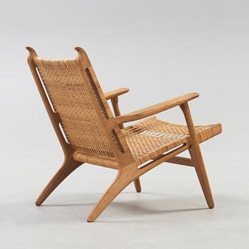 A Hans J Wegner oak and rattan easy chair 'CH-27', Carl Hansen & Son, Denmark,