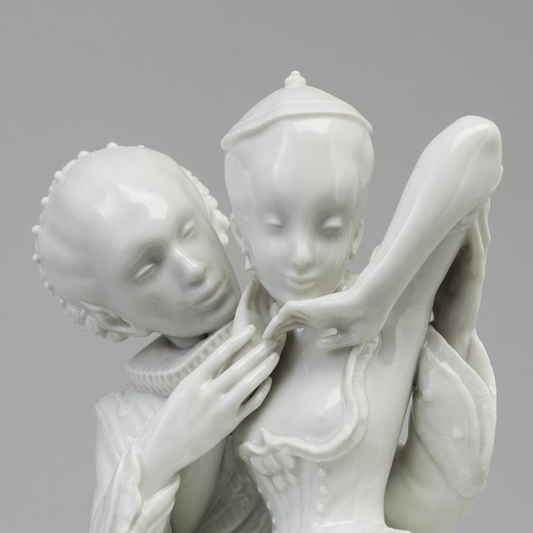 A white glazed Royal Copenhagen porcelain figure, Gerhard Henning, Danmark, 1920's.