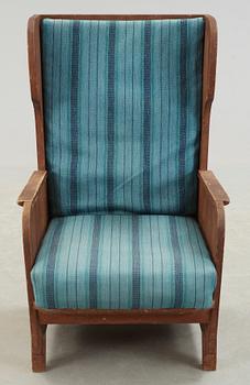 An Axel Einar Hjorth 'Lovö' stained pine armchair, Nordiska Kompaniet, Sweden 1930's.