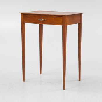 A Swedish Empire mahogany table, early 19th century.