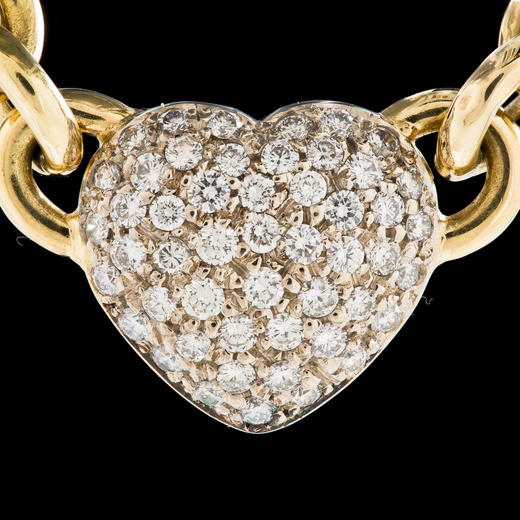 COLLIER, 18 k guld med briljantslipade diamanter ca 1,00 ct. Vikt ca 33 g.