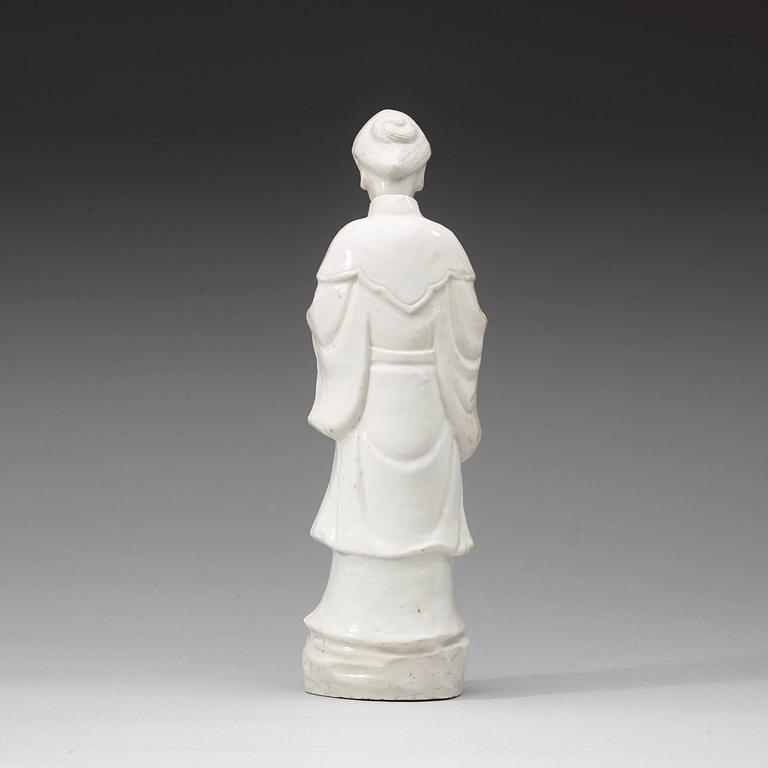 A blanc de chine figure of a court attendant, Qing dynasty, Kangxi ca 1690.