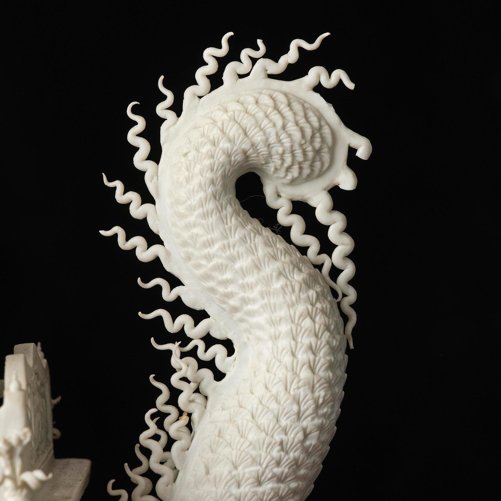 A white biscuit Dragon Boat, Qing dynasty, 19th Century.