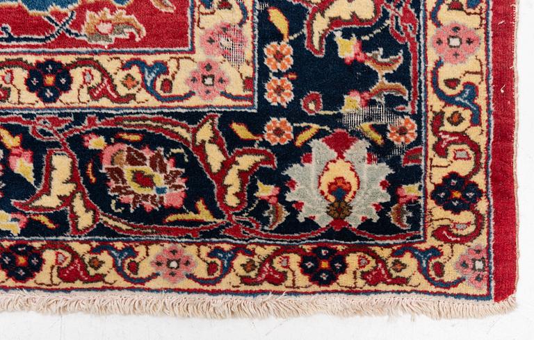 A semi-antique Tabriz carpet, c 358 x 248 cm.