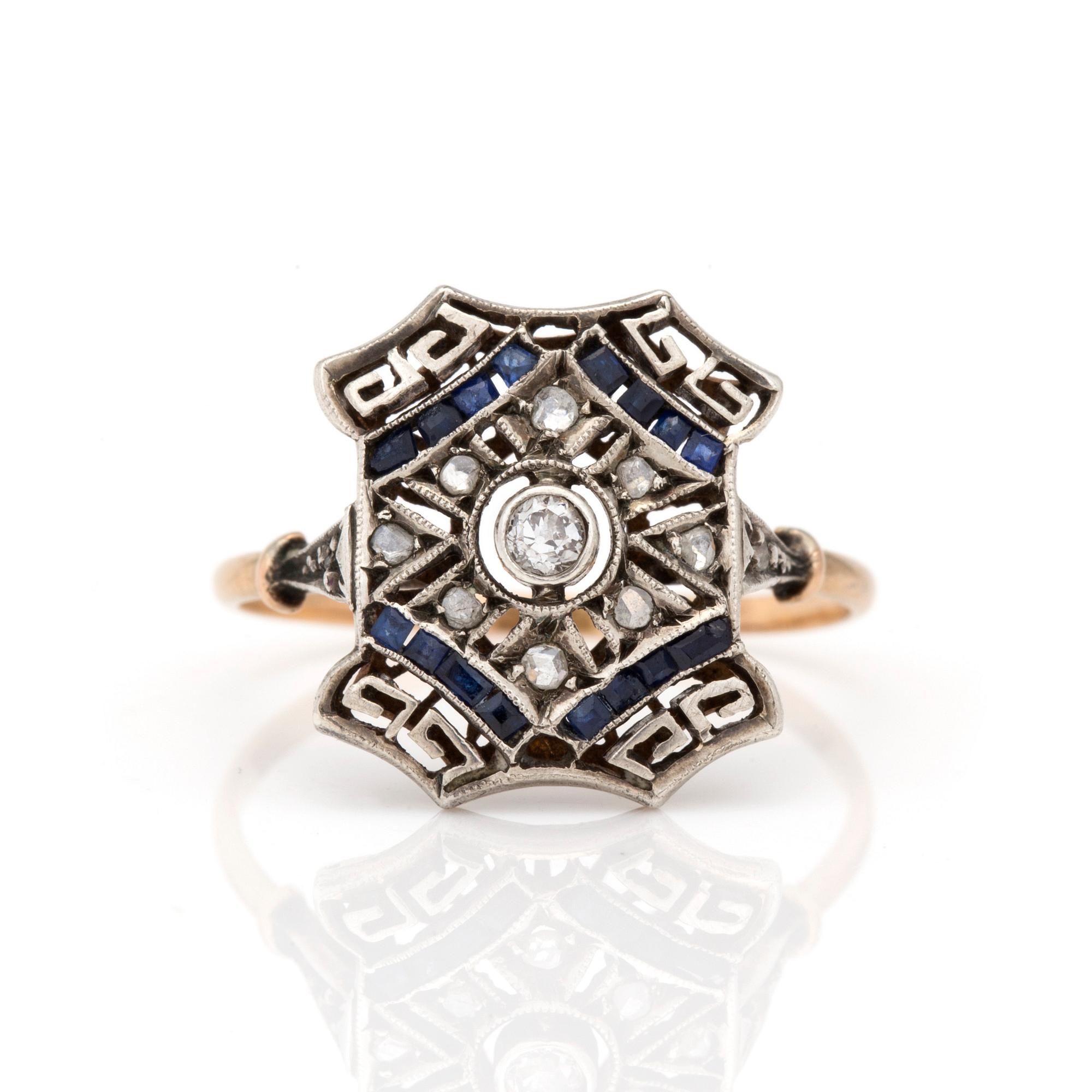 An Art Deco ring with old and rose-cut diamonds and carré and baguette-cut sapphires.