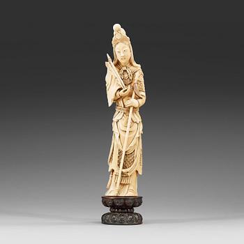 A partly tinted carved ivory figure of the female warrior Mulan, Qing Dynasty, 19th Century.