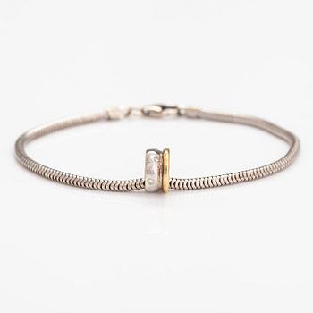 A 14K white and yellow gold bracelet with diamonds ca. 0.03 ct in total.
