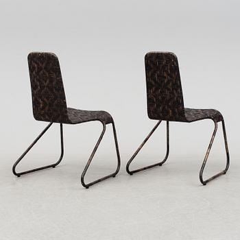 A pair of 'Flo-chairs' by Patricia Urquiola for Driade.