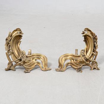 Fire dogs, a pair, Rococo style, 20th century.