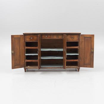 A Gustavian pine cupboard, late 18th century.