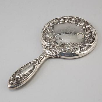 A sterling silver mirror from around year 1900.