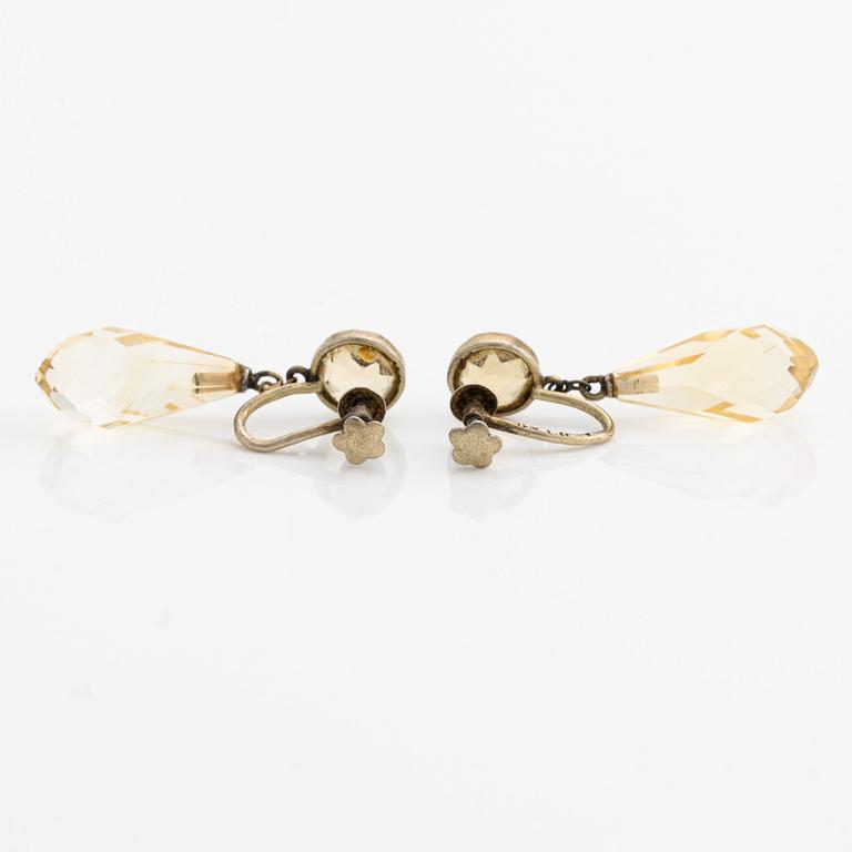 Earrings with briolette-cut citrines.