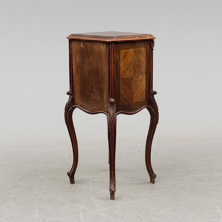 A late 19th century rococo style bedside table.