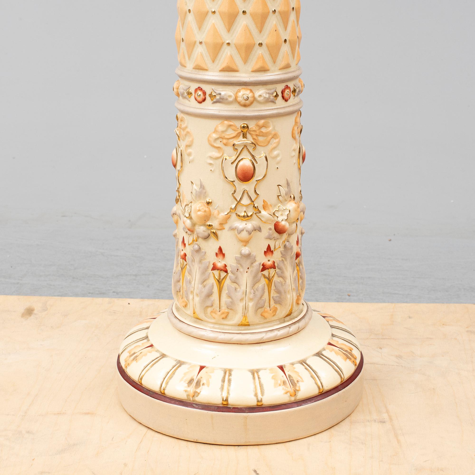 A ceramic pedestal and plant pot from Rörstrand, circa 1900.