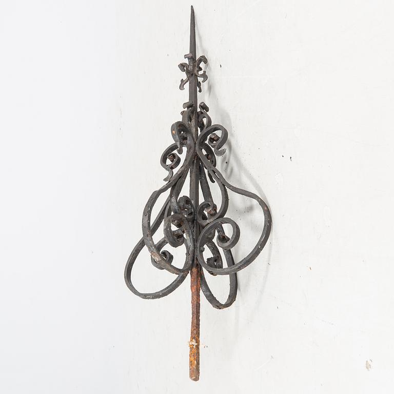 An around 1900s cast iron roof ornament.