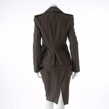 GUCCI, a three-piece suit consisting of jacket, shirt and skirt.