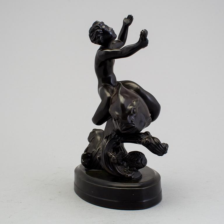 A JUST ANDERSEN sculpture.