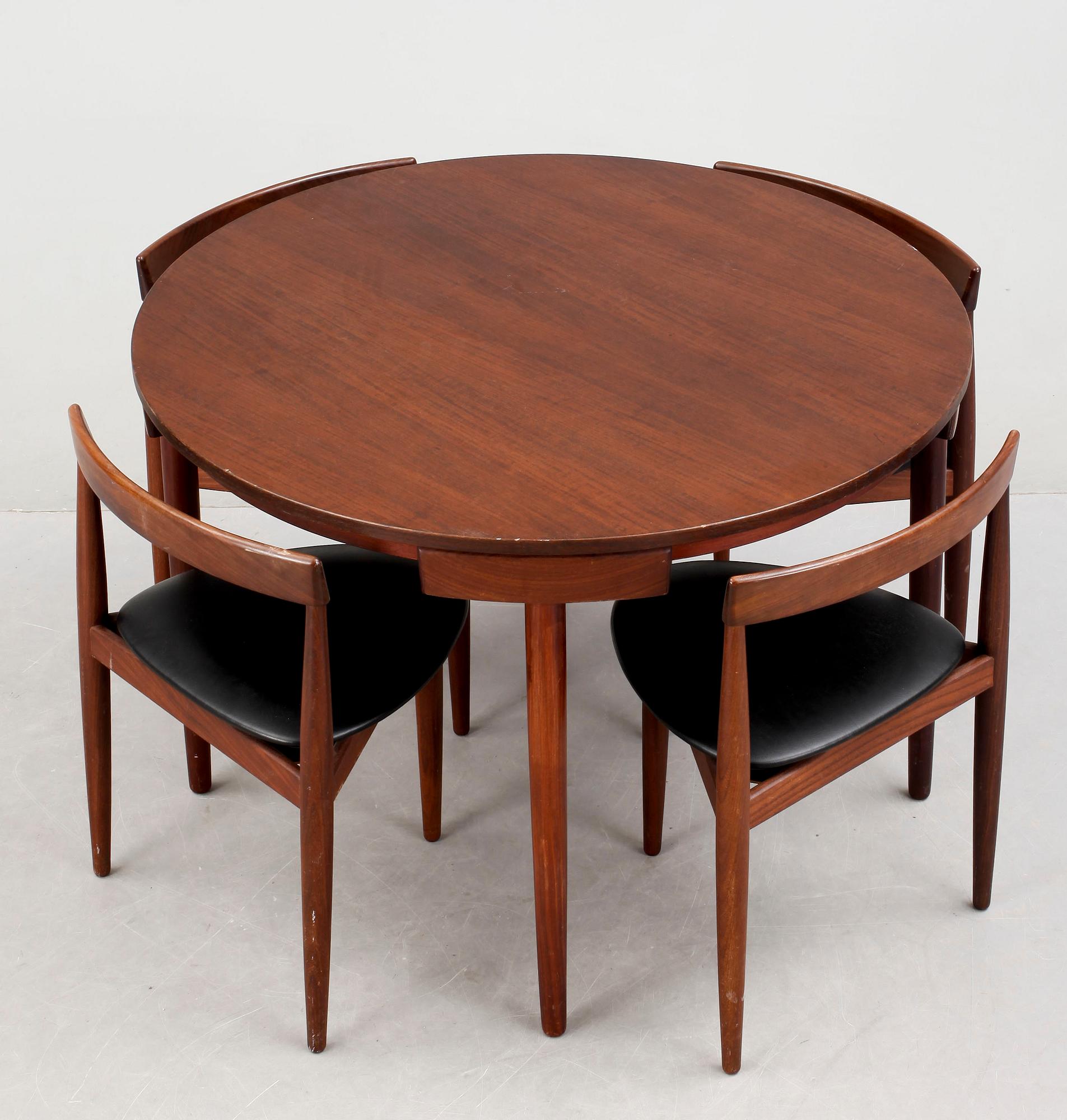 A Hans Olsen teak dining table with four chairs, Frem Røjle, Denmark 1950's.