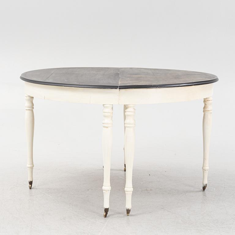 A painted dining table, late 19th Century.