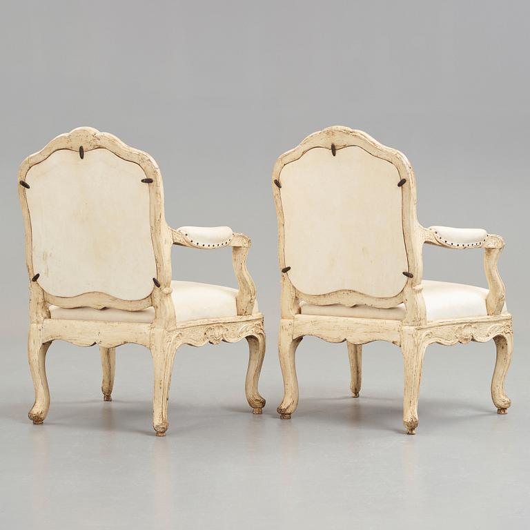 A pair of Swedish Rococo 18th century armchairs attributed to Carl Magnus Sandberg (master in Stockholm 1759-1789).