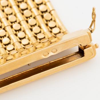 Armband 18K guld med tofs, 1900-talets andra hälft.