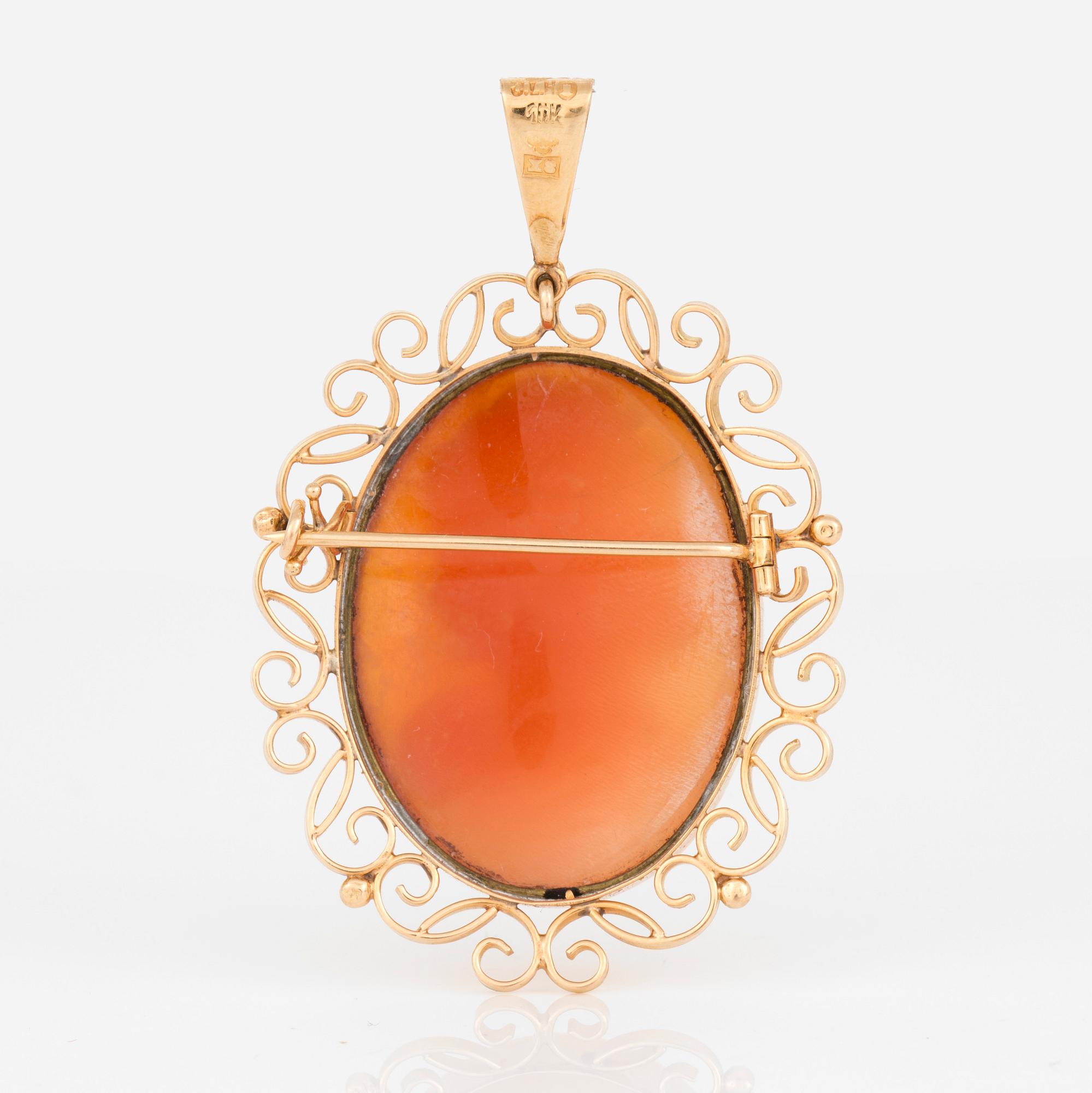 HÄNGE/BROSCH, 18K guld med snäckskalcamé, Stockholm 1948. Total vikt 8,73 g.