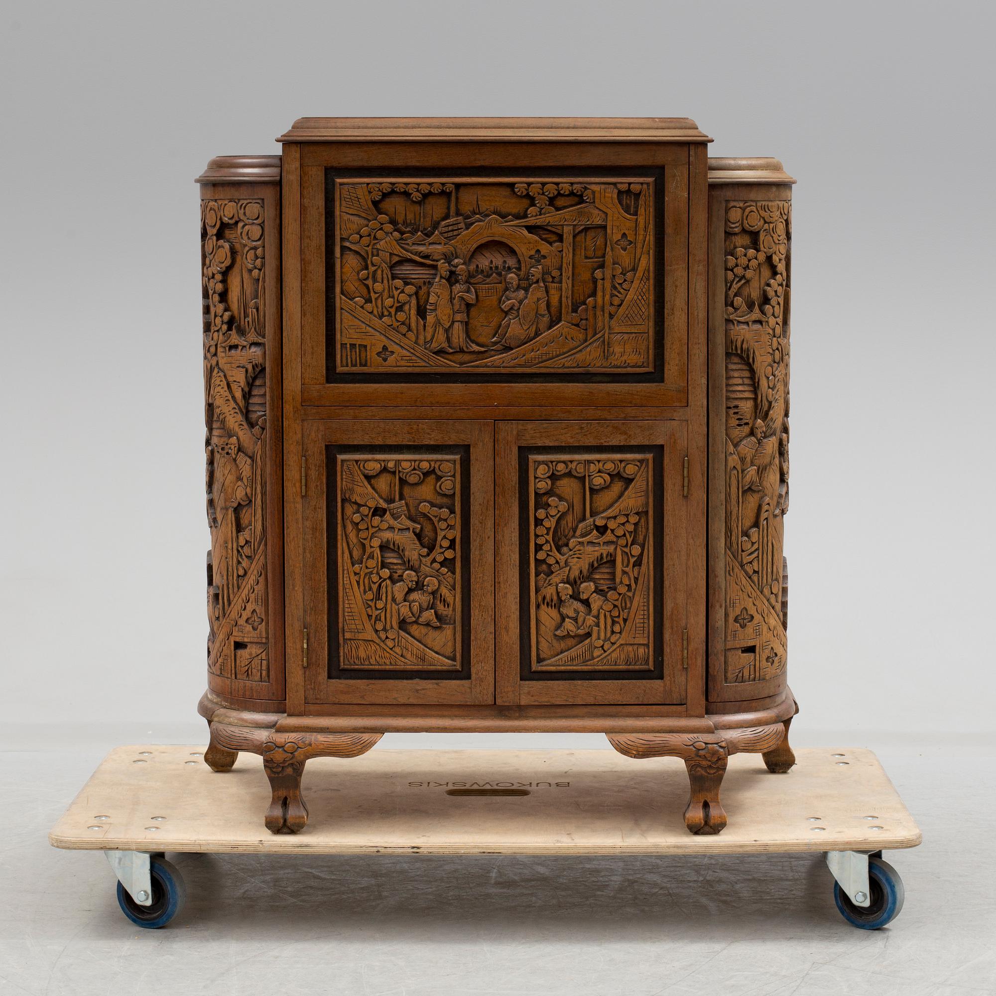 a chinese style bar cabinet from the late 20th century.