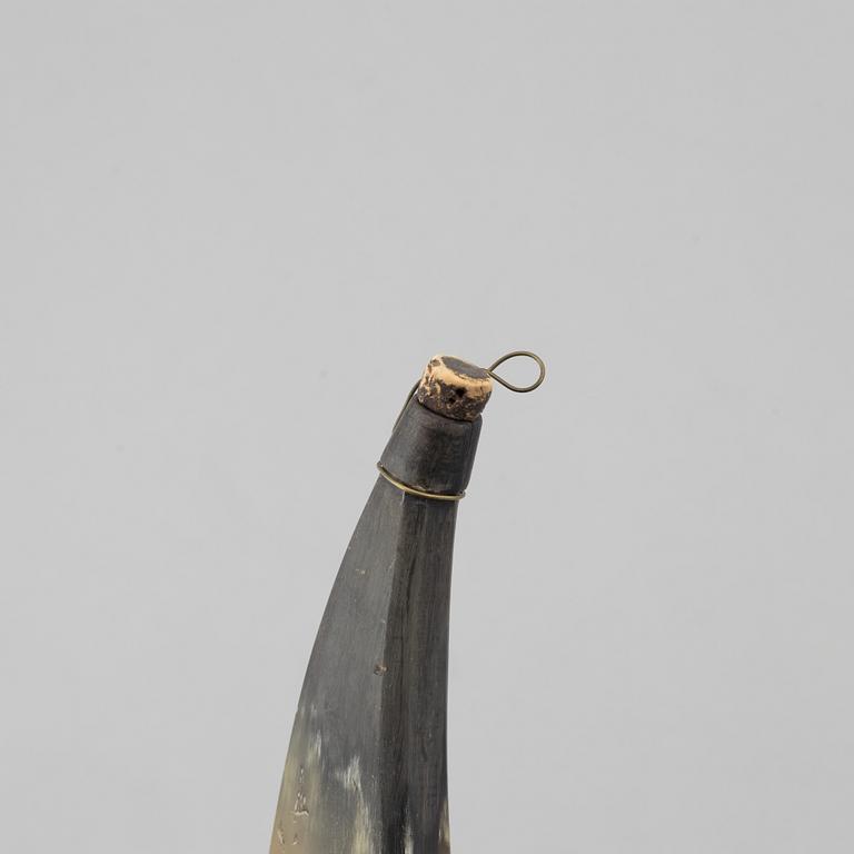 Gunpowder horn and three powder flasks, 19th century.