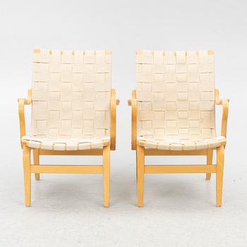Bruno Mathsson, a pair of 'Eva' armchairs, DUX, Sweden, second half of the 20th century.