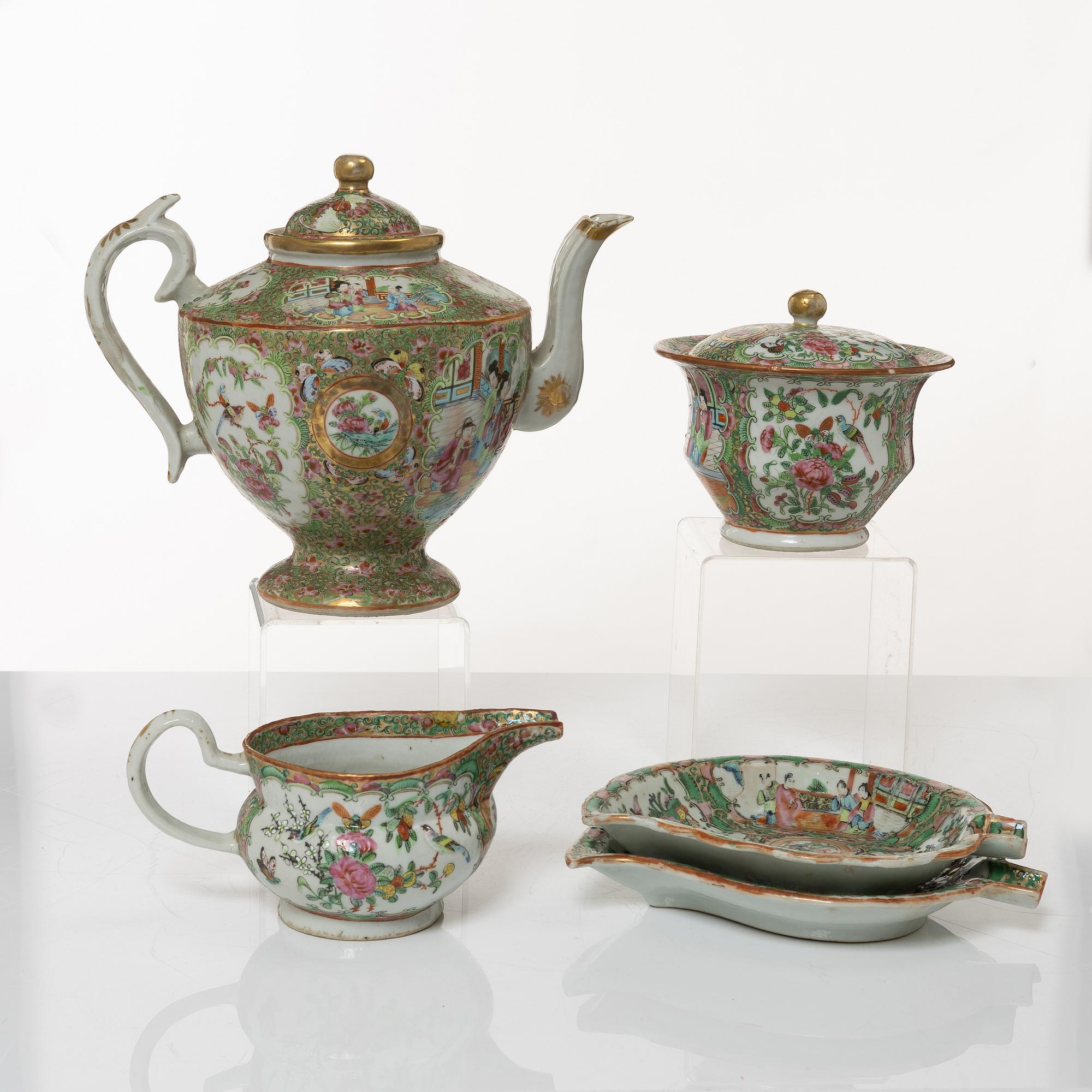 A Chinese Canton porcelain teapot, two leaf dishes, a bowl with cover and a jug, Qing dynasty 19th century and 20th cent.