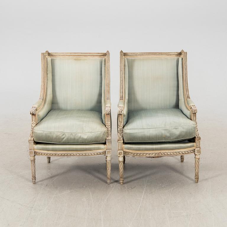 A pair of Louis XVI-style armchairs around year 1900.
