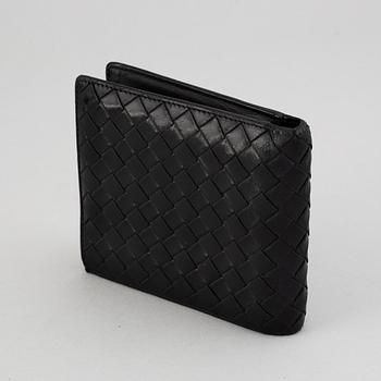 Bottega veneta, a black leather wallet.