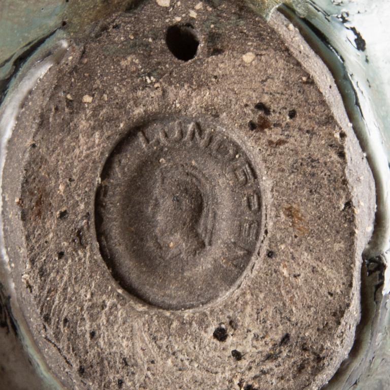 TYRA LUNDGREN, a stoneware sculpture of a bird.