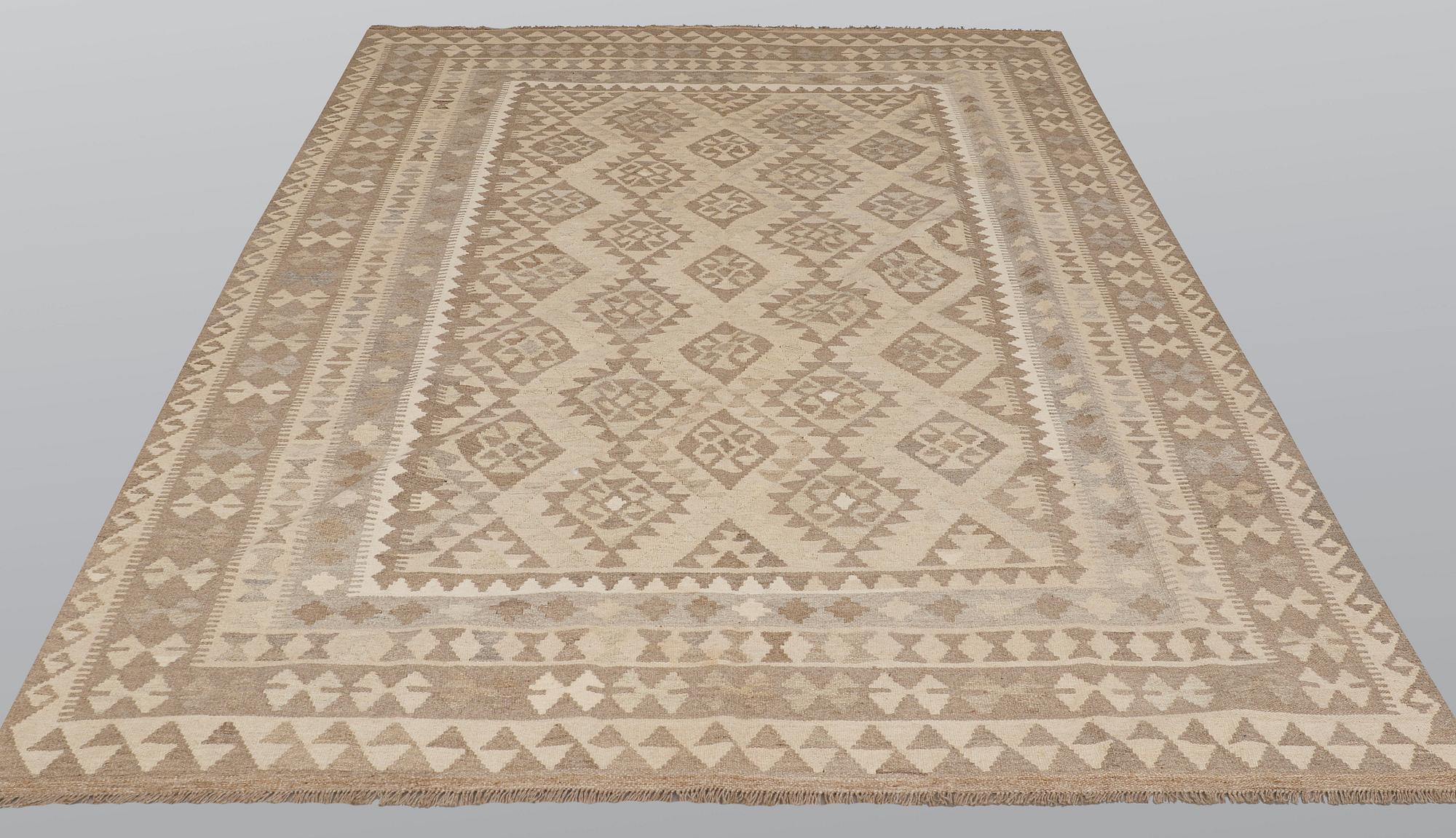 A carpet, kilim, ca 303 x 203 cm.