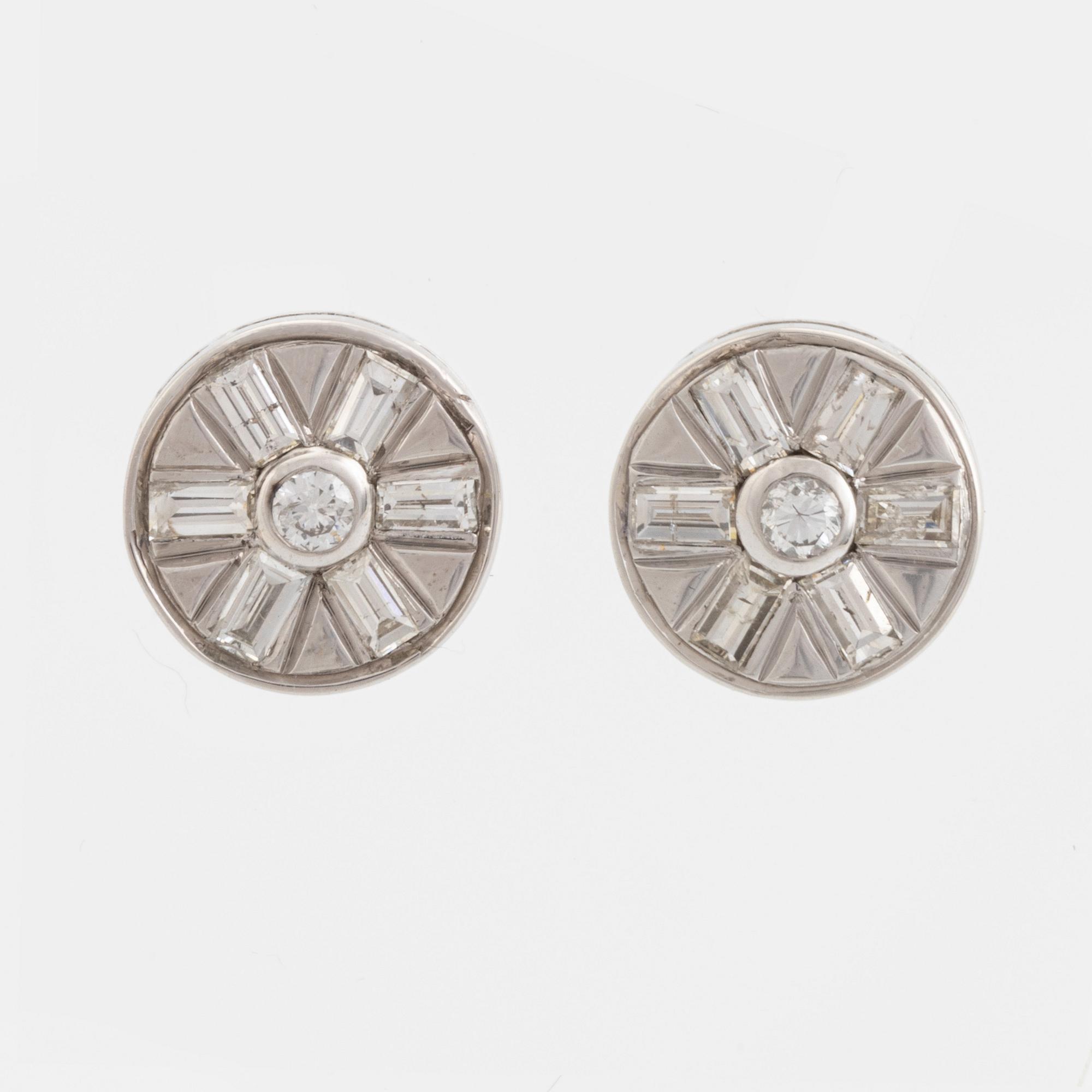 Brilliant and baguette cut diamond earrings.