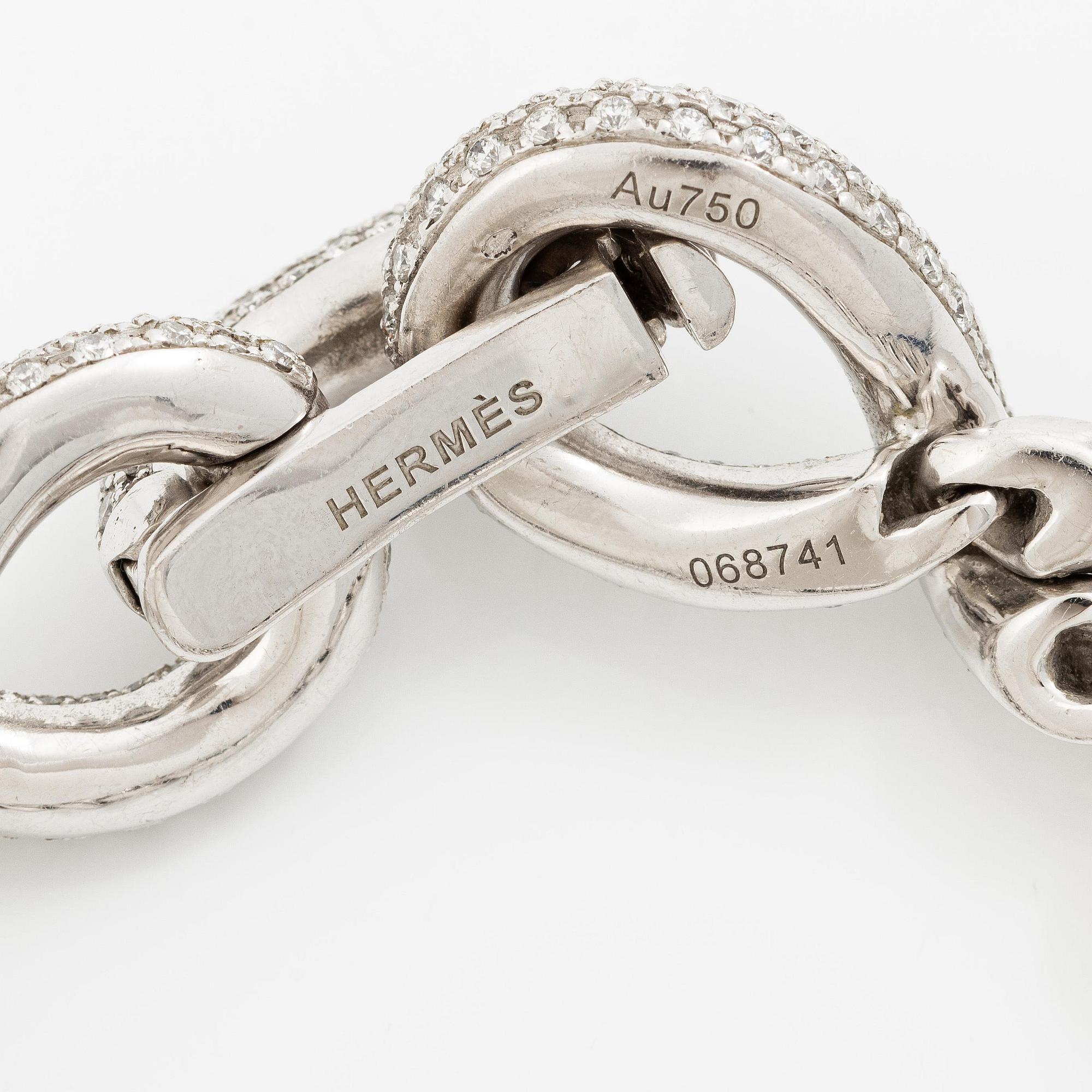 Hermès a bracelet 18K white gold with round brilliant-cut diamonds.